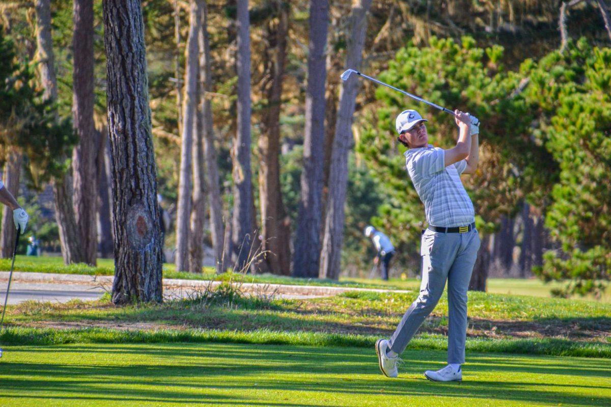 Then-freshman Ben Sluzas hits off on Poppy Hills Golf Course in Pebble Beach, California. NIU competed in the Saint Marys Invitational from Nov. 8 to Nov. 10, 2022, finishing in 17th place. (Photo by Wes Sanderson)