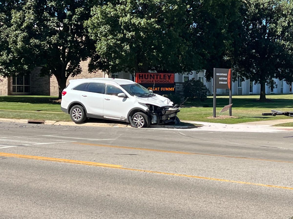 A white SUV was part of a two-vehicle collision Friday. The area of the crash, the 1500 block of South Fourth Street, was reopened to the public at around 11:20 a.m. (Devin Oommen | Northern Star) (edited) 