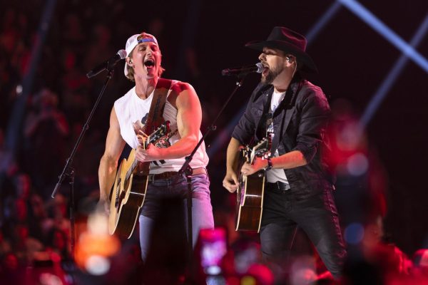 Matt Lang (left) and Tyler Joe Miller perform during the Canadian Country Music Awards in Hamilton, Ontario. The Peoples Choice Country Music Awards will take place on Sept. 28 and will celebrate everything country. (Nick Iwanyshyn/The Canadian Press via AP)