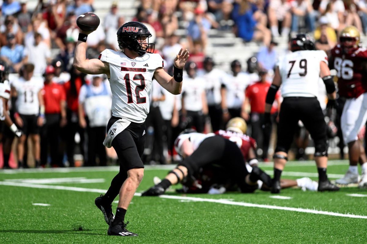 Redshirt senior quarterback Rocky Lombardi throwing a pass to a teammate against Boston College on Sep. 2. The Huskies defeated the Eagles 27-24 in overtime. (Gaelen Morse | NIU Athletics)