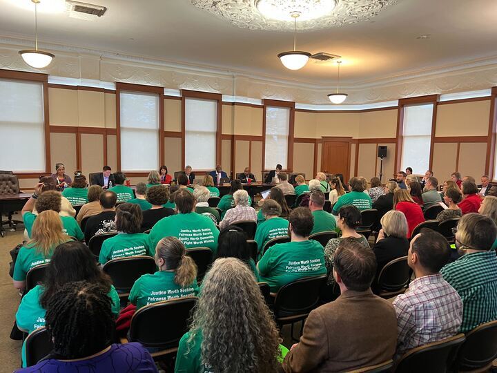 NIU union members and faculty attend the Board of Trustees meeting Thursday at Altgeld Hall. The board listened to public comment from union members about employee wages at NIU. (Devin Oommen | Northern Star)