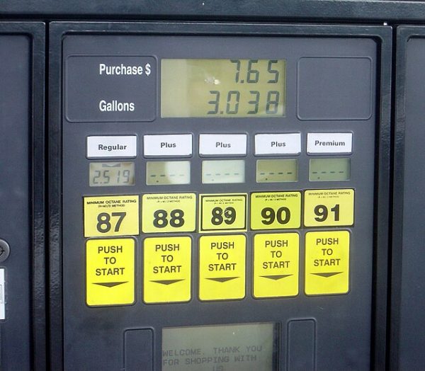 A gas pump ticks up as a tank gets filled. Gas prices are decreasing right now. (Bobak | Creative Commons Attribution-Share Alike 2.5)
