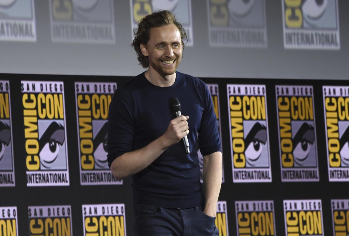 Actor Tom Hiddleston speaks on the Comic Con stage in San Diego in 2019 as part of the Marvel Studios panel. Hiddlestons show Loki has a new season premiering on Oct. 5 on Disney+. (Chris Pizzello/Invision/AP)