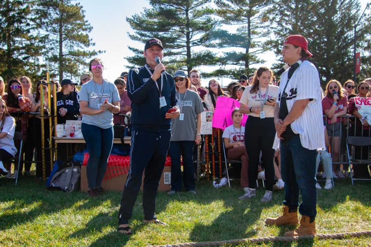 Dr. Clint-Michael Reneau, vice president for Student Affairs, speaking at last years opening of the championship women’s tugs match. Reneau talked more about his job here at NIU and about his own life. (Northern Star File Photo)