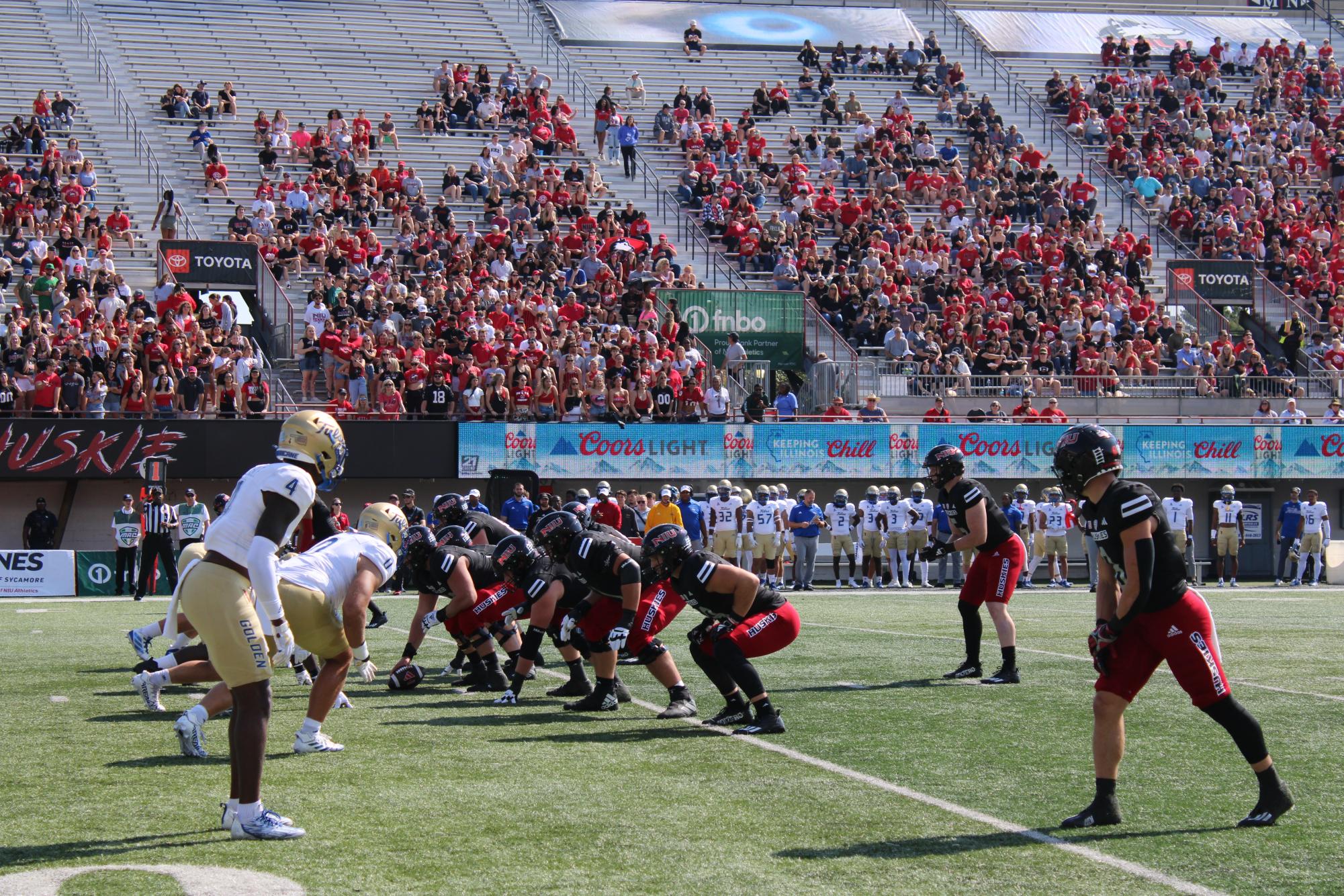 NIU offensive line sets against Tulsa defensive line during Saturdays game at the Huskie Stadium. On Saturday, the Huskies were defeated by Tulsa 22-14. (Cameron Whittington | Northern Star)