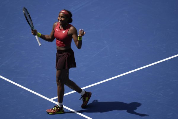 American tennis star Coco Gauff responds to the crowd at the U.S. Open after defeating Latvias Jelena Ostapenko on Tuesday. Gauff is now in the semifinals of the championships and will face Karolína Muchová on Thursday. (Seth Wenig | Associated Press)
