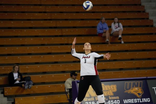 NIU graduate student outside hitter Katie Erdmann serves the ball during NIUs Sept. 15 match against the University of Dayton Flyers at the UNI Tournament. Erdmann recorded a double-double in both of the Huskies matches against Bowling Green State University on Thursday and Friday. (Logan Colglaizer | UNI Athletics)