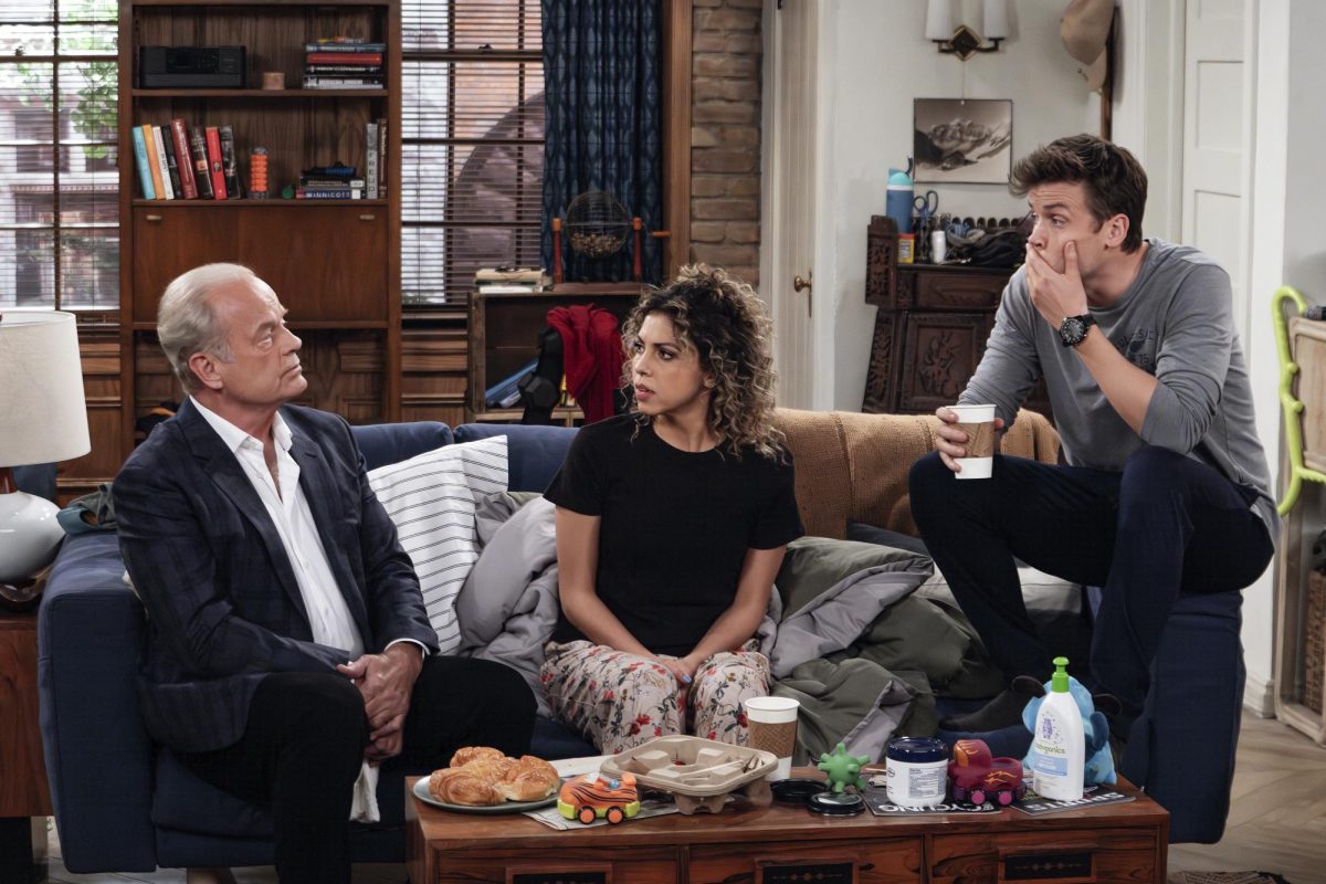From left) Kelsey Grammar as Frasier Crane, Jess Salgueiro as Eve and Jack Cutmore-Scott as Freddy sit on a couch in a scene from the 90s sitcom Frasier. The series is getting a reboot which will feature most of the original cast. (Chris Haston/Paramount+ via AP)