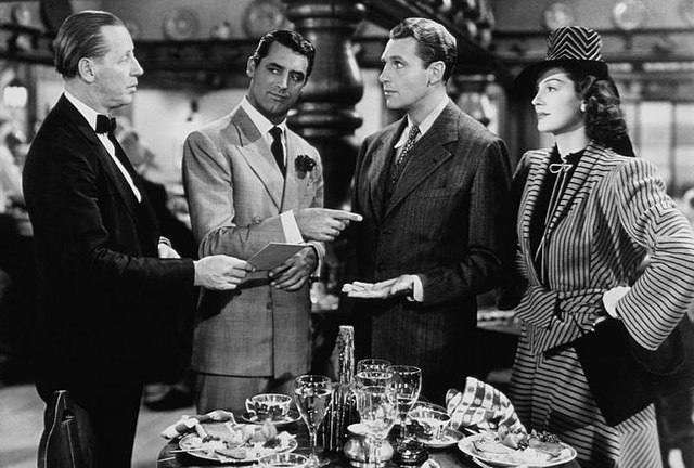 (From left) Irving Bacon, Cary Grant, Ralph Bellamy and Rosalind Russell in the 1940s film His Girl Friday. Destress from college with this ridiculously witty film. (Wikimedia Commons)