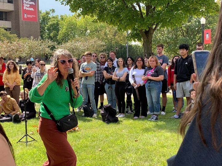 Sister Cindy, a Christian advocate, preaches to the crowd of NIU students. Sister Cindy visited NIUs campus Monday afternoon at the MLK Commons. (Rachel Cormier | Northern Star)