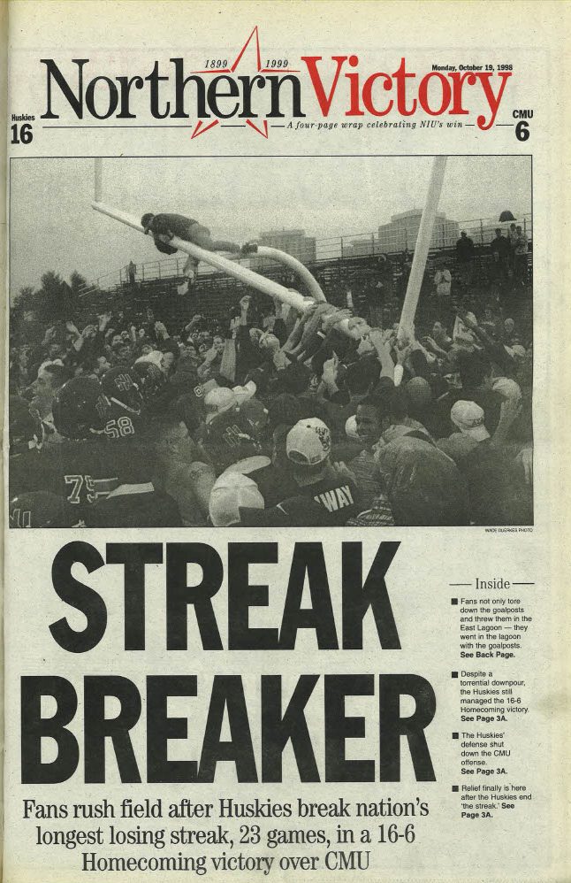 The front page of the Oct. 19, 1998, print edition of the Northern Star shows the post-game celebration for NIU’s 91st Homecoming Game. Fans seized the goalposts at Huskie Stadium in the final seconds of a 16-6 win over Central Michigan University. (Northern Star Archive | Wade Duerkes)