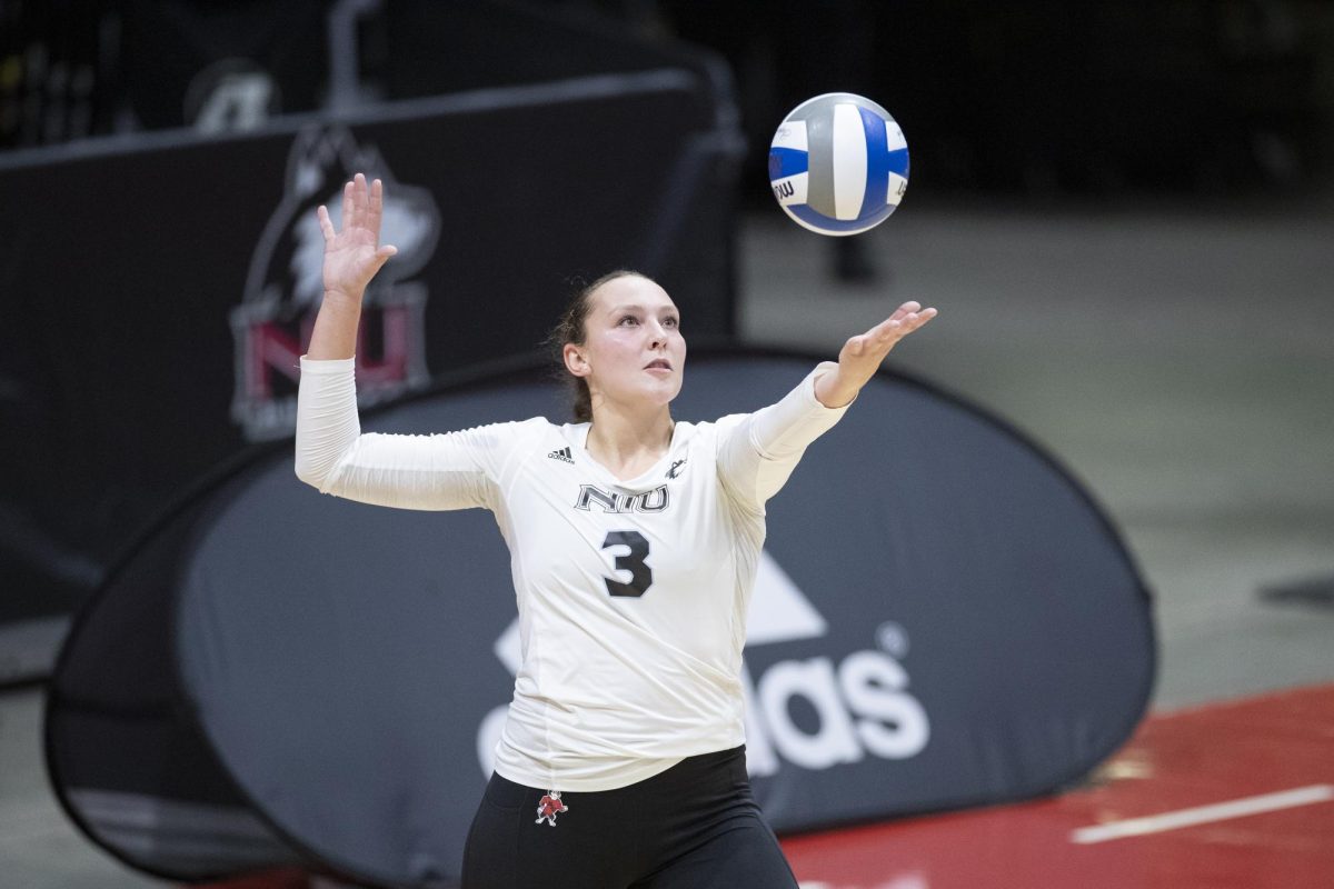 Graduate student outside hitter Katie Erdmann serves during NIU volleyball’s home opener against Chicago State University on Aug. 25 in the NIU Convocation Center. Erdmann led the Huskies with 11 kills in a 3-0 sweep of Kent State University on Friday in Kent, Ohio. (Courtesy of NIU Athletics)