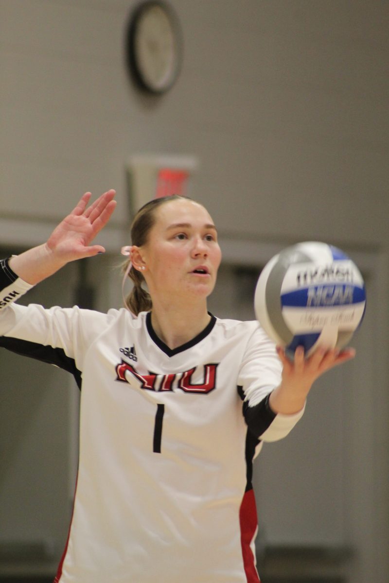 NIU+volleyball+player+Crew+Hoffmeier+gets+ready+to+serve+the+ball.+Crew+is+originally+from+Louisville%2C+Kentucky%2C+and+attended+Assumption+High+School+where+she+was+a+three-time+state+champion.+%28Sasha+Norman+%7C+Northern+Star%29+