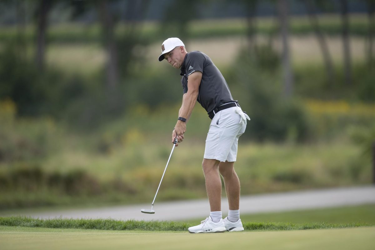 Graduate student golfer Zach Place watches his shot during practice. The NIU mens golf team finished its 2023 fall season with an 18th place finish at the Quail Valley Invitational. (Courtesy NIU Athletics)