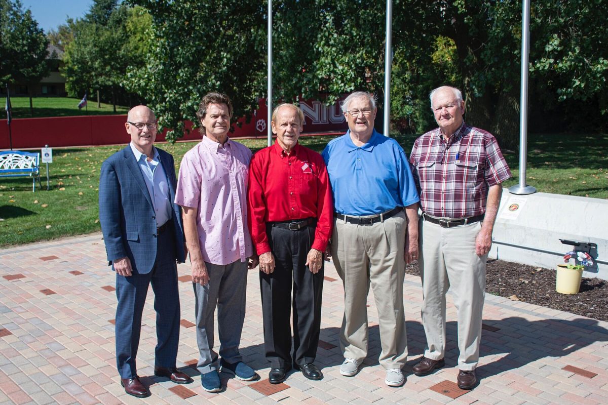 The DeKalb County Veterans Recognition Fund committee stand in front of the DeKalb Veterans Memorial (from left): Mike Coghlan, Ron Lofton, Michael Embrey, Jerry Smith, and Paul Jerde. The fund will support the DeKalb County Veterans group honor veterans. (Courtesy of the DeKalb County Community Foundation)