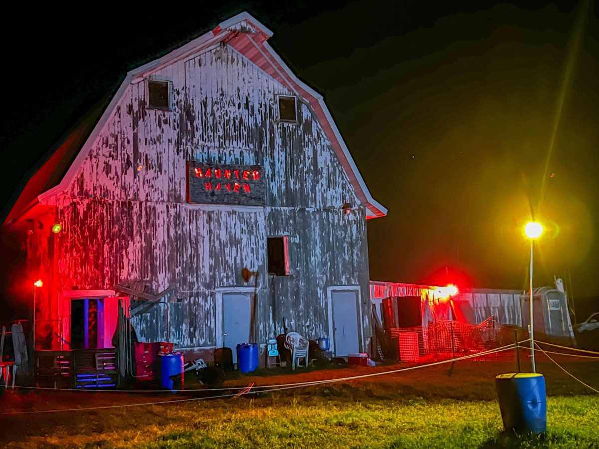 The+Haunted+Haven+barn+stands+illuminated+by+red+spotlights.+Owner+Melissa+Norton+has+run+the+Haunted+Haven+for+14+seasons.+%28Brandon+Clark+%7C+Northern+Star%29