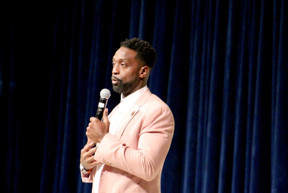 Former Bears cornerback Charles Tillman speaks onstage Tuesday at the Carl Sandburg Auditorium. Tillman spoke to NIU students about being an underdog and his journey to the NFL. (Lucas Didier | Northern Star) 