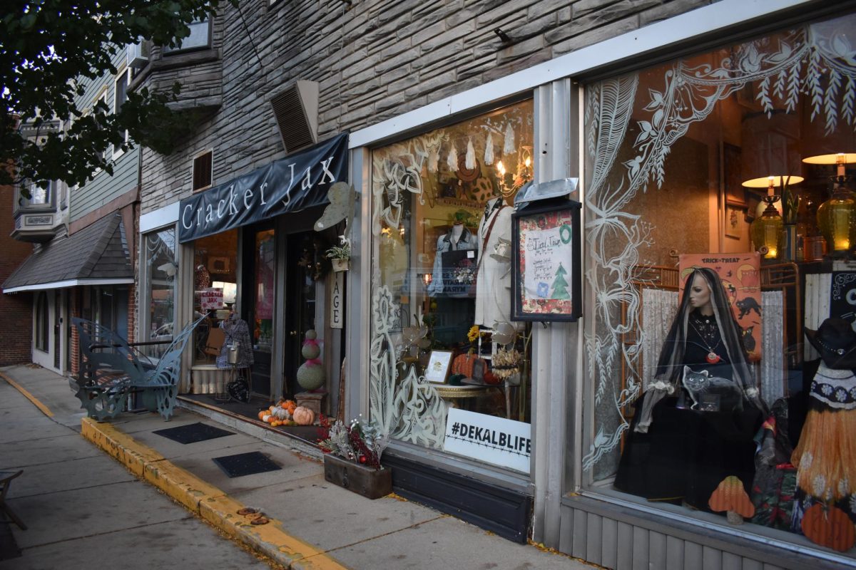 The outside of CrackerJax is decorated with Halloween decor. Lauren Woods, the owner of the store, has been in DeKalb for 39 years. (Nick Glover | Northern Star)