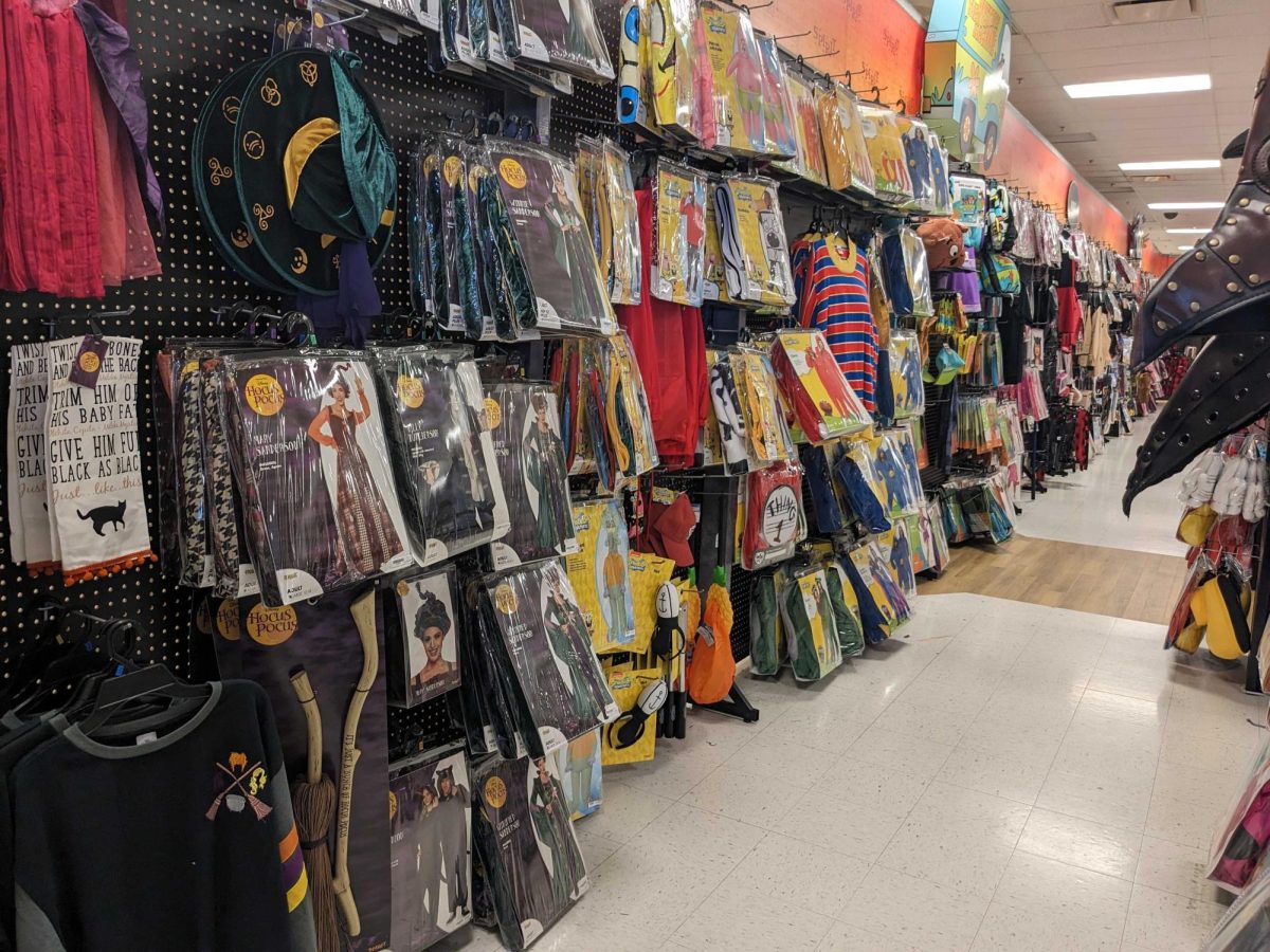 A row of Halloween costumes displayed at Spirit Halloween. The Illinois Department of Public Health reminds trick-or-treaters to be aware of potential dangers this Halloween. (Nyla Owens | Northern Star)
