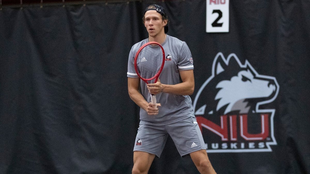 Then-junior Mikael Vollbach stands ready to receive a serve during mens tennis match against the University of Illinois Chicago on Feb. 22. Vollbach and senior Cheng En Tsai won two doubles matches before falling in the Round of 16 at the ITA Regional this weekend. (Courtesy of NIU Athletics)