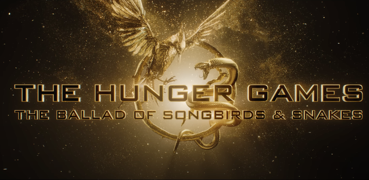 A+golden+bird+and+snake+sit+behind+The+Hunger+Games+title.+The+new+Hunger+Games+film+is+out+in+theaters+and+is+based+on+the+book+of+the+same+name+by+Suzanne+Collins.+%28Courtesy+of+YouTube%29