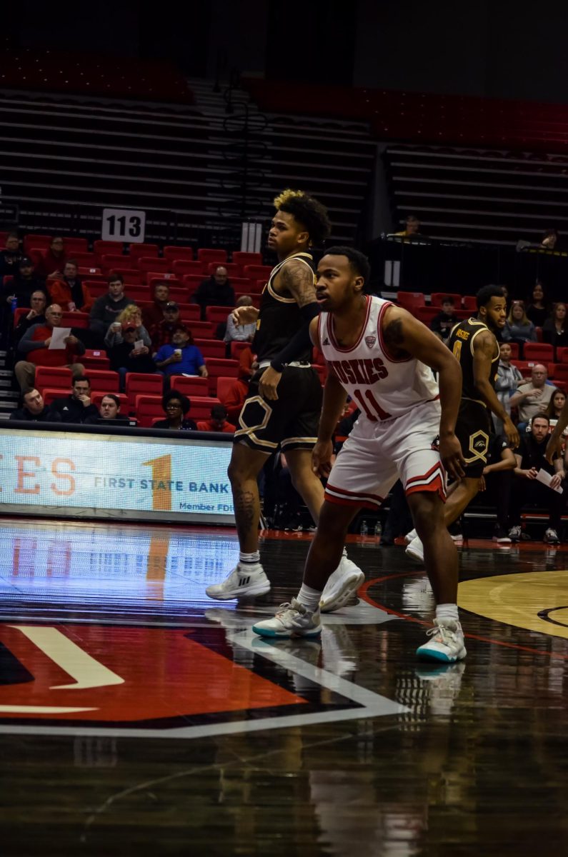 Then-sophomore+guard+David+Coit+stares+down+his+defender+in+a+home+game+against+Western+Michigan+University+on+Feb.+11.+Coit+scored+a+career-high+34+points+to+lead+NIU+mens+basketball+to+an+89-79+victory+over+DePaul+University.+%28Alyssa+Queen+%7C+Northern+Star%29
