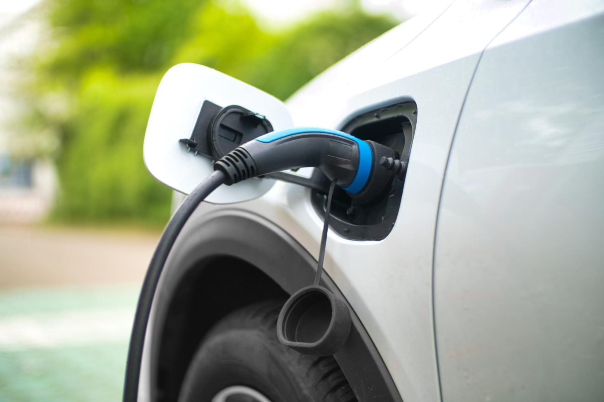 A charging cord for an electric car charges the vehicle. Illinois electric car rebate program opened Wednesday. (Getty Images)