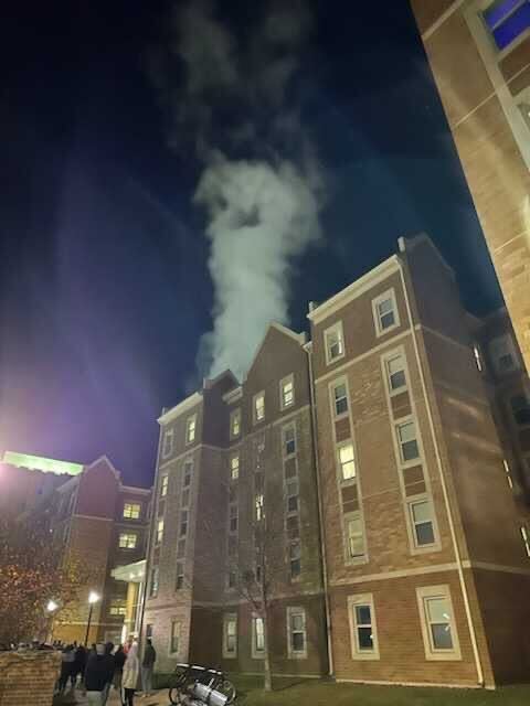 Steam billows from Patterson Hall West after a steam relief valve burst on Nov. 14. Opinion Columnist Lexi Nebel believes NIU dorms are too expensive for structural emergencies to occur so frequently. (Courtesy of Lydia Dunker)