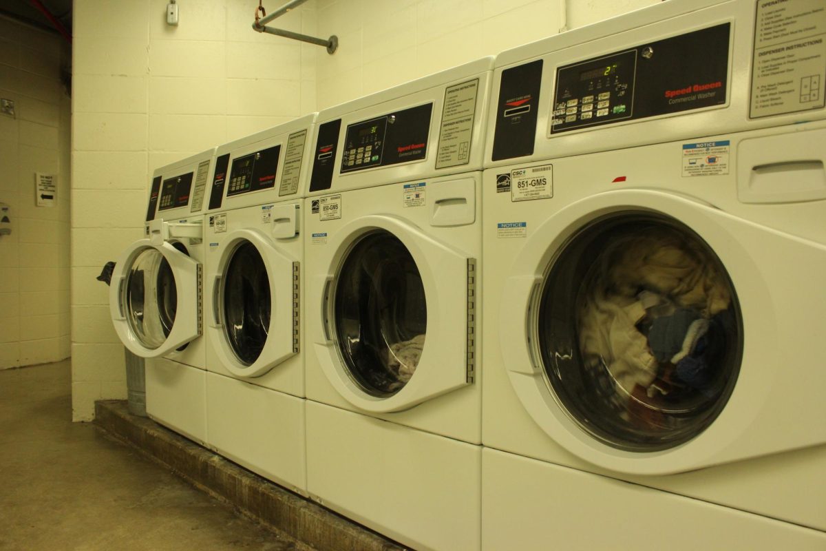 Clothes spinning in washing machines in Stevenson Towers laundry room. Stevenson Towers has four set laundry rooms throughout each tower. (Ryanne
Sandifer | Northern Star)