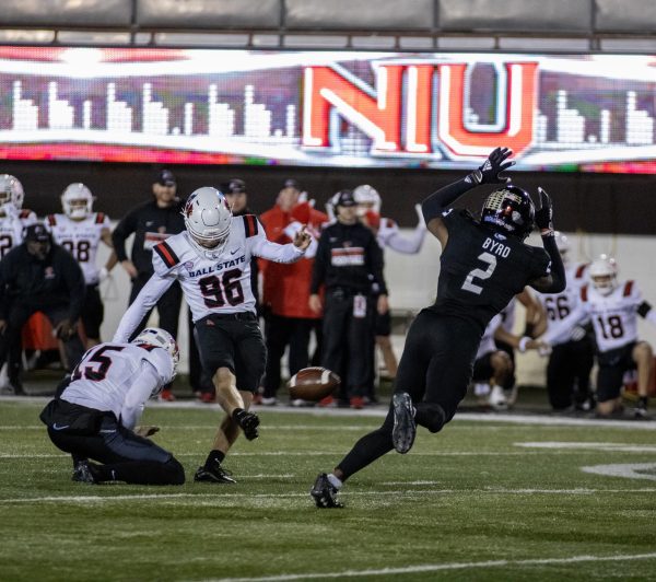 Junior cornerback Javaughn Byrd attempts to block a Ball State University field goal. The Huskies were defeated by the Cardinals by a final score of 20-17 on Tuesday. (Tim Dodge | Northern Star)