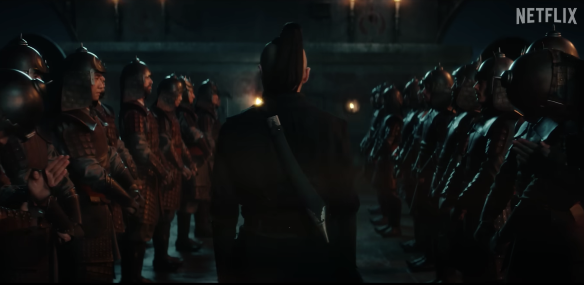 A man walks between two rows of soldiers with helmets on. Avatar: The Last Airbender will be getting a live-action series on Netflix in 2024. (Courtesy of YouTube)