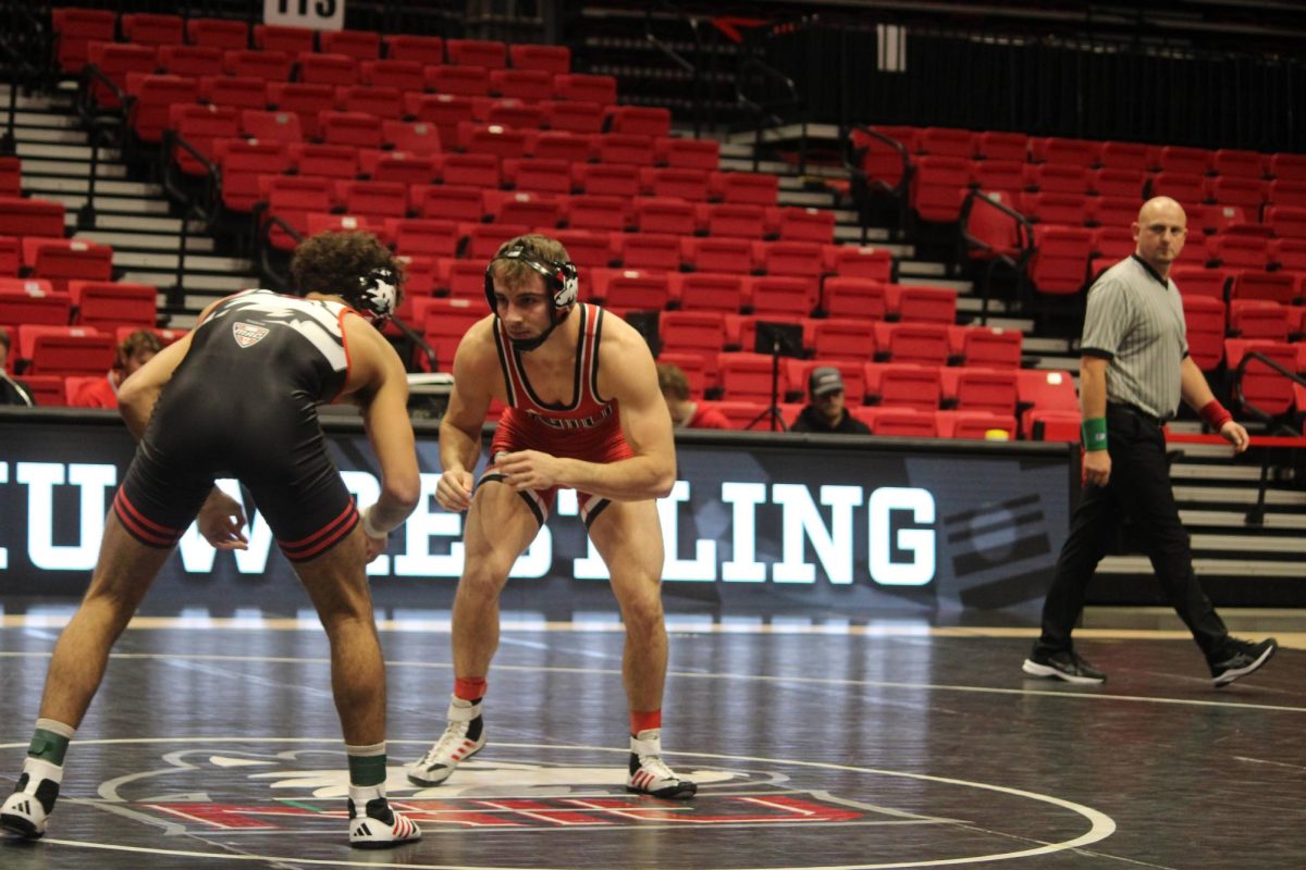Freshman Collin Arch prepares to grapple during the red/black dual on Oct. 27. Arch took the 149-pound title at the Lindenwood Open. (Amanda Springer | NIU Athletics)