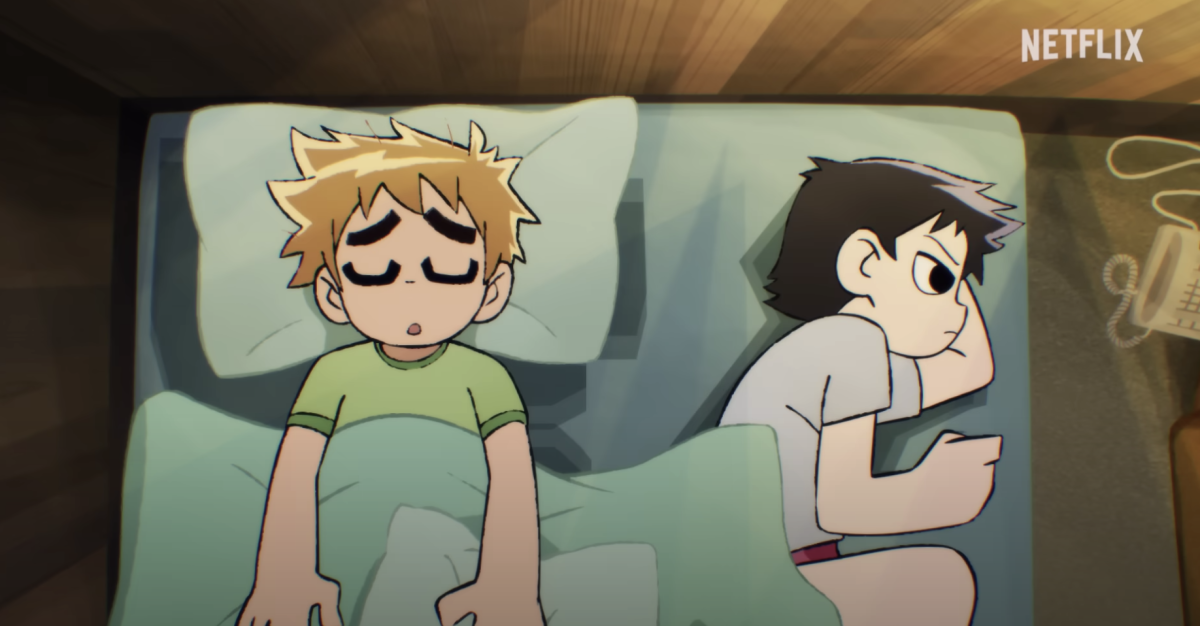 A blond and brunette boy lie next to each other in bed. The eight episode animated series Scott Pilgrim Takes Off is now streaming on Netflix. (Courtesy of YouTube)