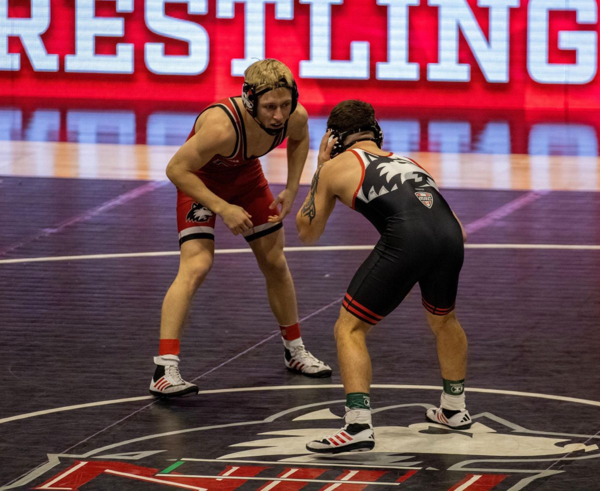 Redshirt freshman Danny Curran and Dylan Gvillo stare each other down at the Red/Black Dual on Oct. 27. NIU defeated Lindenwood University and St. Ambrose University by a combined score of 98-0 on Friday at the Huskie Duals. (Tim Dodge | Northern Star)