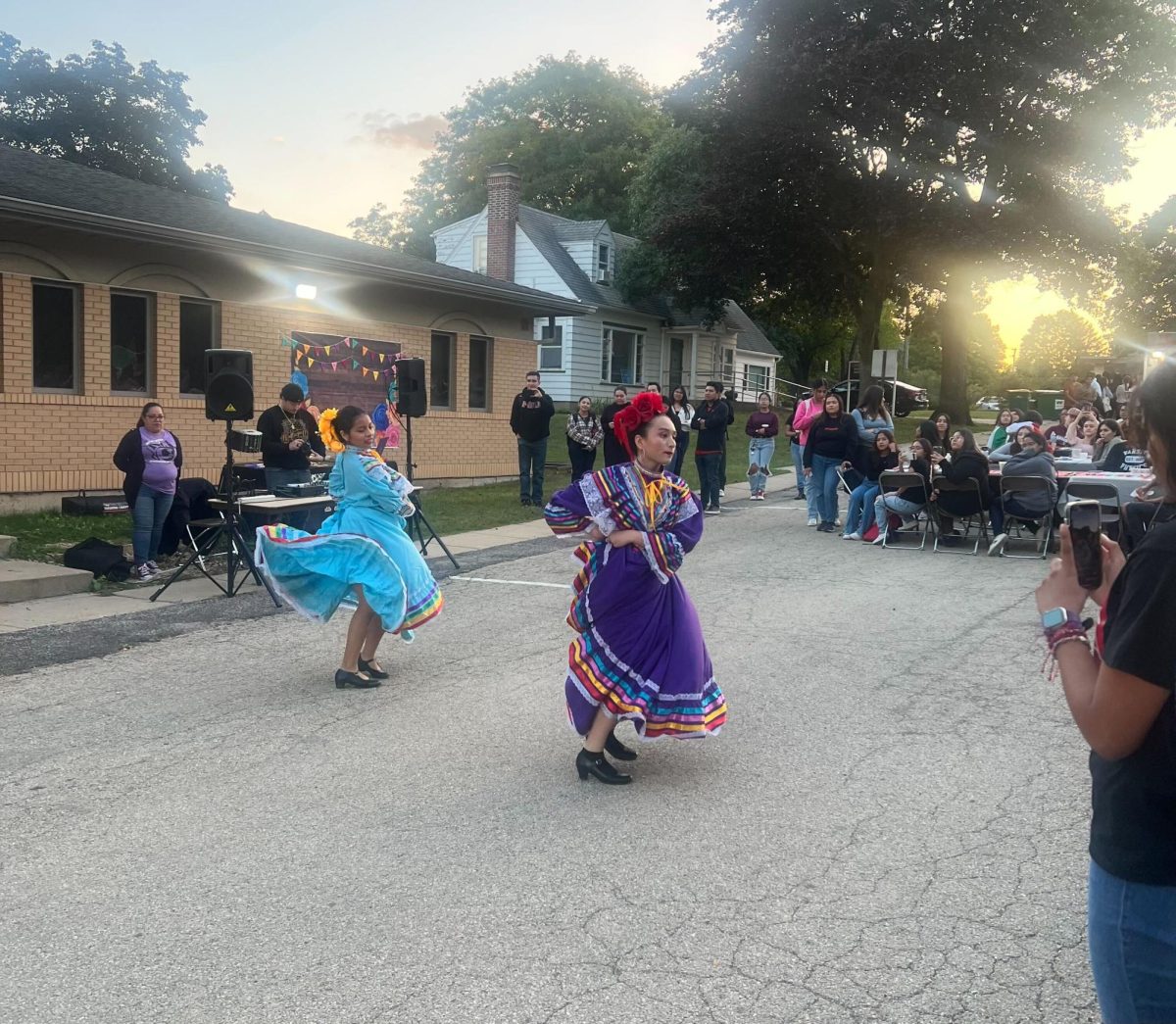 Folklórico dancers perform for a crowd Sept. 13 at the Latino Resource Center for El Grito. El Grito is celebrated on the eve of Mexican Independence Day, but was celebrated in honor of all Latino heritage at the event. (Kaitlyn Lee-Gordon | Northern Star)