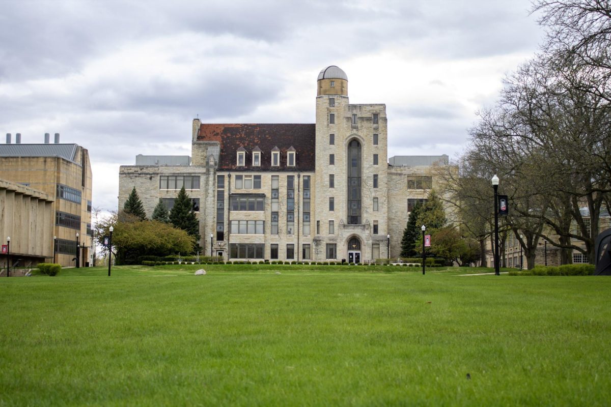 A view of NIU’s Davis Hall from the university’s quad on an overcast day.