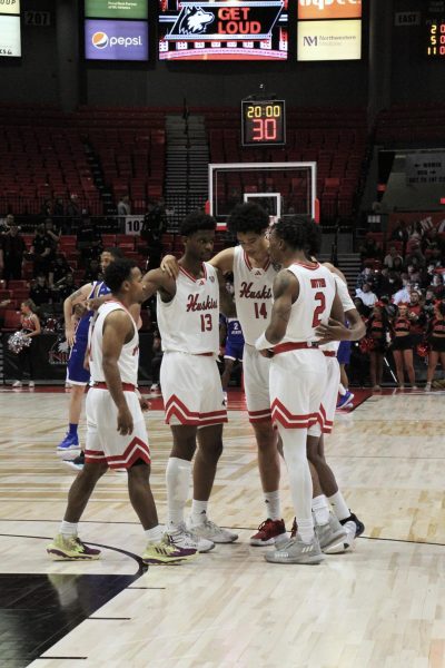 The NIU men's basketball team huddles for a pregame talk about their match against Indiana State on Tuesday.