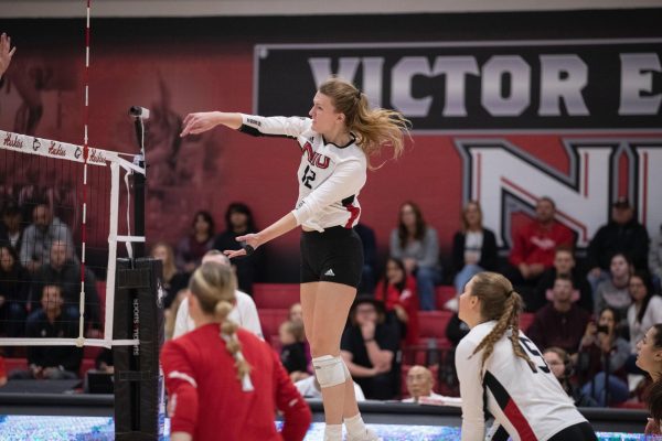 NIU senior opposite/outside hitter Emily Dykes attacks during the Huskies’ home conference match against Eastern Michigan University Oct. 13 at Victor E. Court. Dykes entered the transfer portal Sunday after starting 23 matches for NIU in 2023. (Scott Walstrom | NIU Athletics)