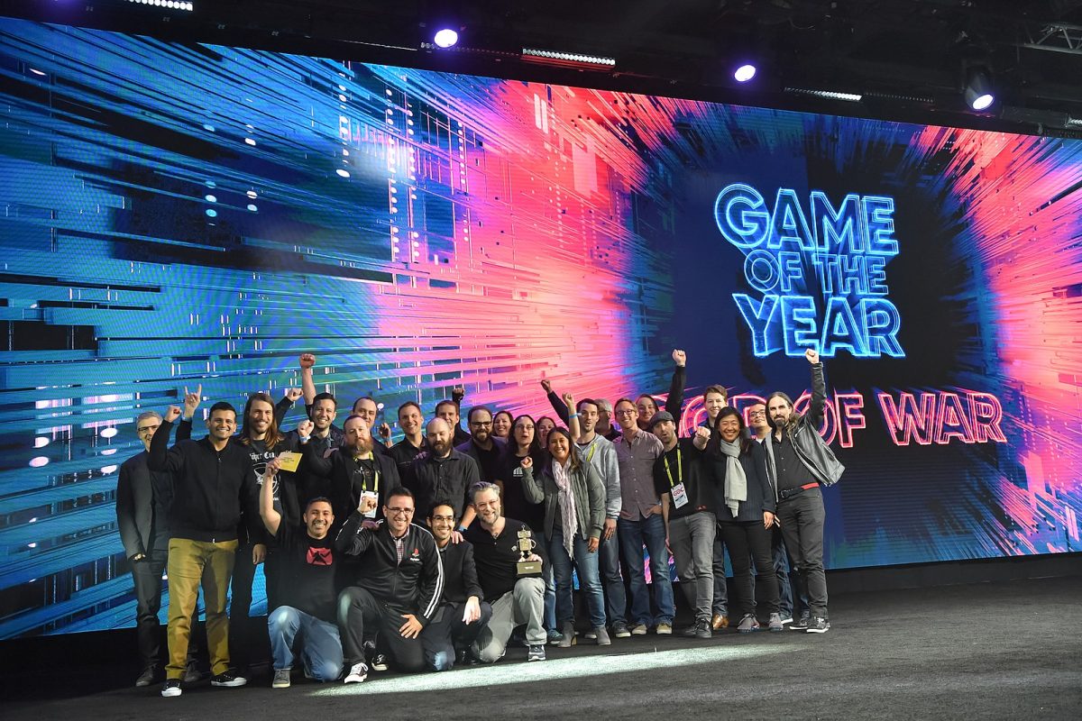The+game+developers+of+God+of+War+stand+together+with+fists+raised+on+Dec.+6%2C+2018.+The+2023+Game+Awards+will+take+place+on+Dec.+7.+%28Wikimedia+Commons%29