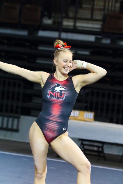 NIU sophomore Kiera OShea strikes a pose during her floor exercise routine at a Jan. 13 meet against Bowling Green State University in Bowling Green, Ohio. OShea scored a 9.900 on vault, a score that is tied for the fourth-best in program history. (Courtesy of Dena Martz)
