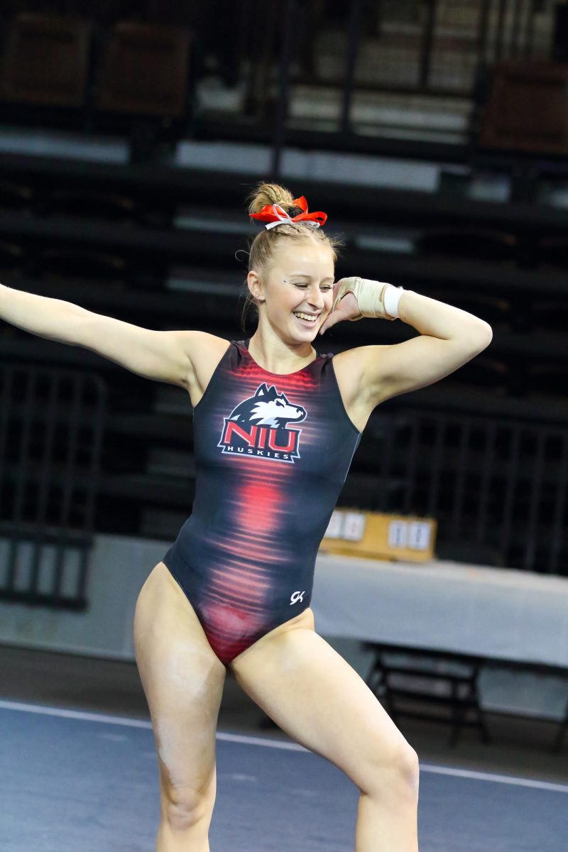 NIU sophomore Kiera OShea strikes a pose during her floor exercise routine at a Jan. 13 meet against Bowling Green State University in Bowling Green, Ohio. OShea scored a 9.900 on vault, a score that is tied for the fourth-best in program history. (Courtesy of Dena Martz)