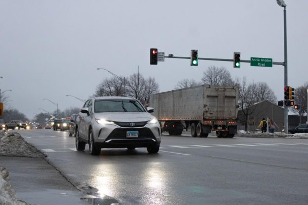 A silver car crosses the intersection of Lincoln Highway and Annie Glidden Road Wednesday in DeKalb. Illinois State Police are running a new “Road Rage, Don’t Engage” campaign to help combat road rage. (Sean Reed | Northern Star