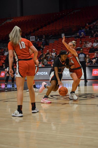 Then-junior guard Jayden Marable attempts to dribble past a defender in an NIU womens basketball home game against Ball State University on Feb. 18, 2023. Marable, the shortest player listed on NIUs current roster, is second in rebounds per game for the Huskies. (Alyssa Queen | Northern Star)