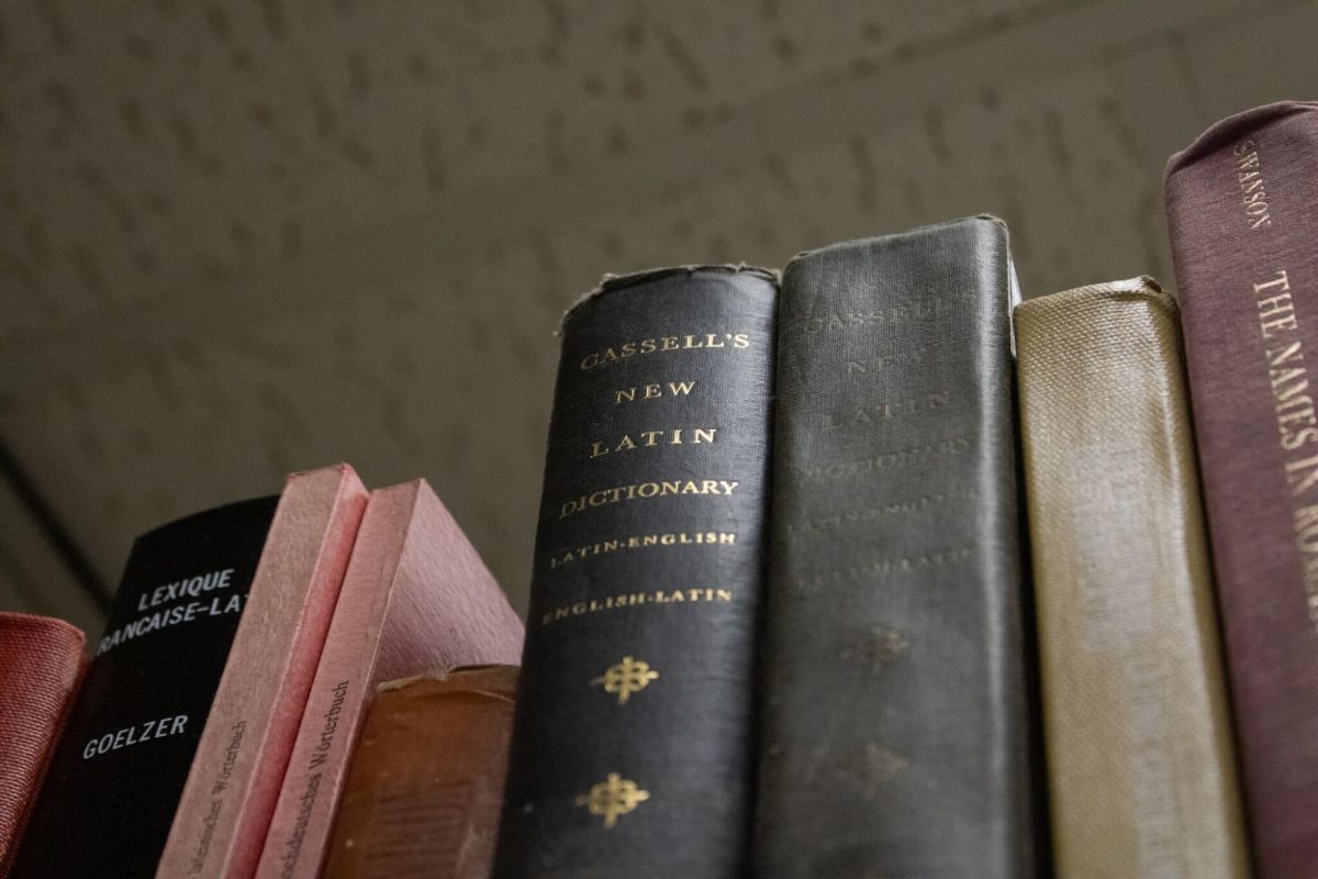 A copy of “Cassell’s New Latin Dictionary” sits on the top shelf in the language and literature section on the third floor of Founder’s Memorial Library. Latin was last taught at NIU in the spring of 2022. (Sean Reed | Northern Star)