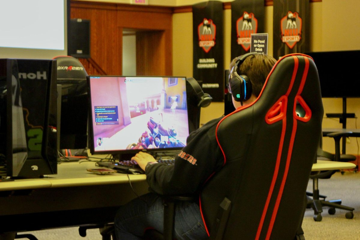 McKenna O’Donnell, a junior mechanical engineering major, plays Overwatch on Wednesday in the Esports Arena. NASCAR Chicago Street Race is partnering with NIU Esports to put on the Rocket League Rev Up Saturday. (Josephine Dunmore | Northern Star)