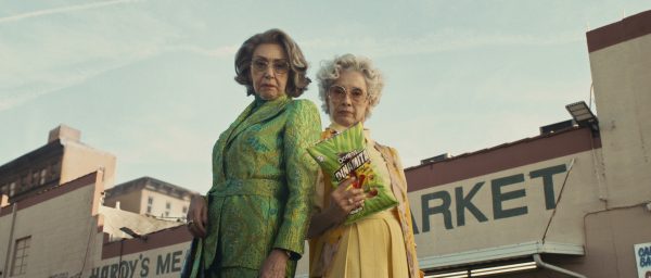 Two women stand holding a bag of Doritos Dinamita. These women chased after a man who took the last bag of chips in what was one of the standout commercials from this years Super Bowl. (Frito-Lay via AP)