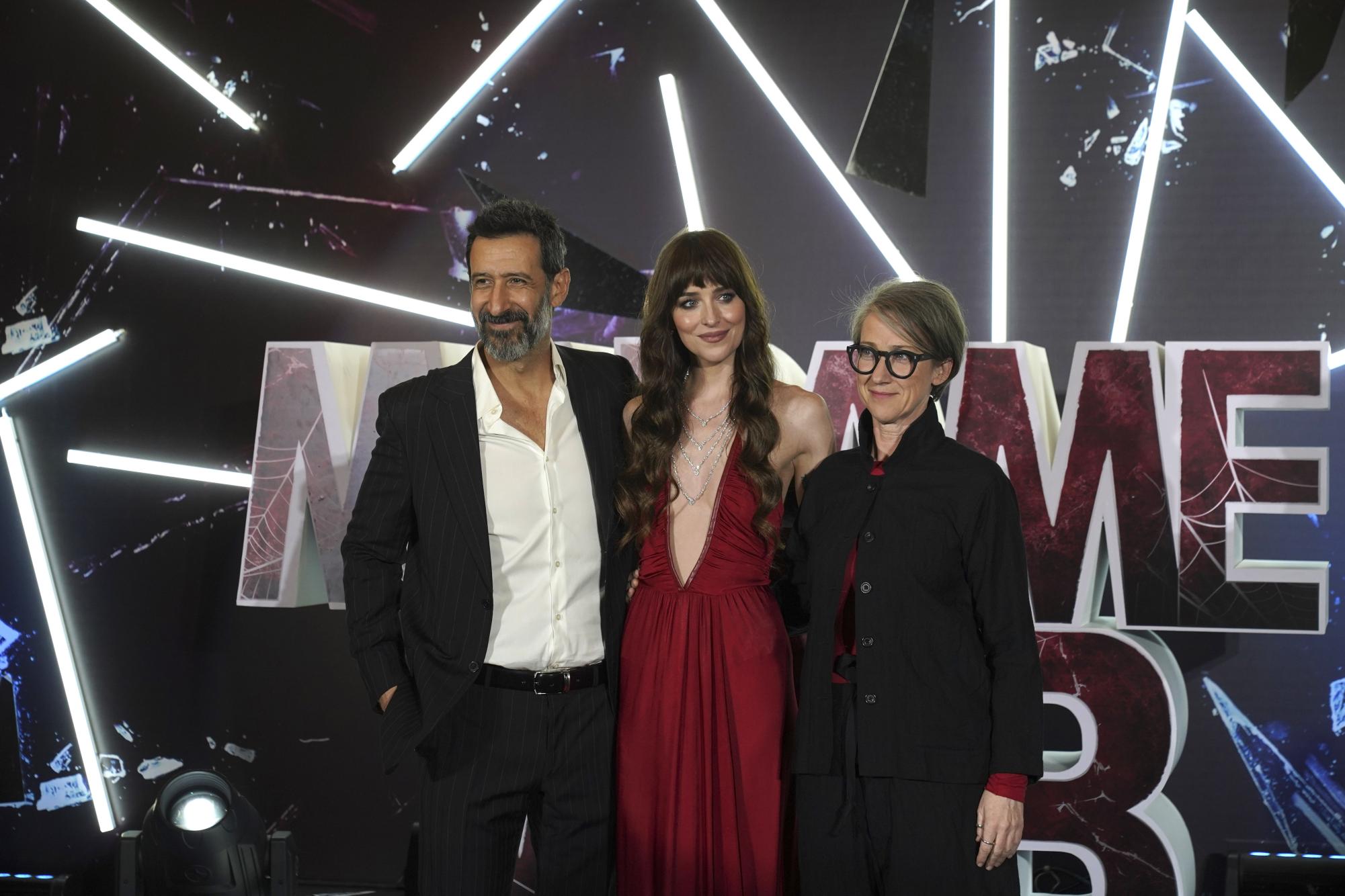 Actors José María Yazpik (from left), Dakota Johnson and filmmaker S. J. Clarkson pose on the red carpet premiere of Madame Web in Mexico City. Madame Web is the most recent Marvel movie to come out. (Marco Ugarte | AP Photo) 