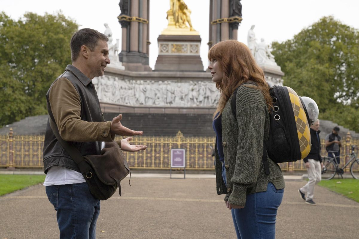 Sam Rockwell (left) and Bryce Dallas Howard stand opposite of each other in a scene from Argylle. The new action film will leave fans bored and irritated. (Peter Mountain/Apple via AP)