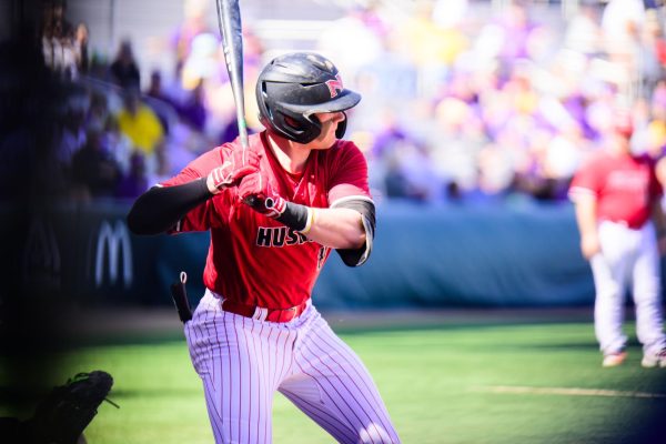 Senior catcher/outfielder Collin Summerhill eyes a pitch in an NIU baseball game against Louisiana State University Saturday. Summerhill recorded two hits against the University of Iowa on Tuesday, including an RBI triple in the eighth inning. (Courtesy of LSU Athletics)