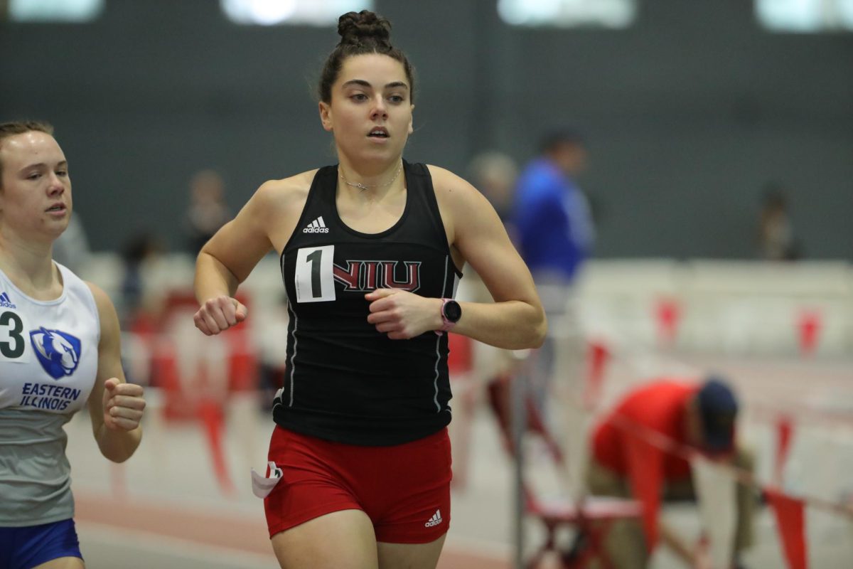 Senior middle distance runner Julia Finegan runs past an Eastern Illinois University opponent at the Redbird Tune Up on Friday. Finegan brought home two top-five finishes for the Huskies Friday. (Courtesy of Illinois State Athletics)